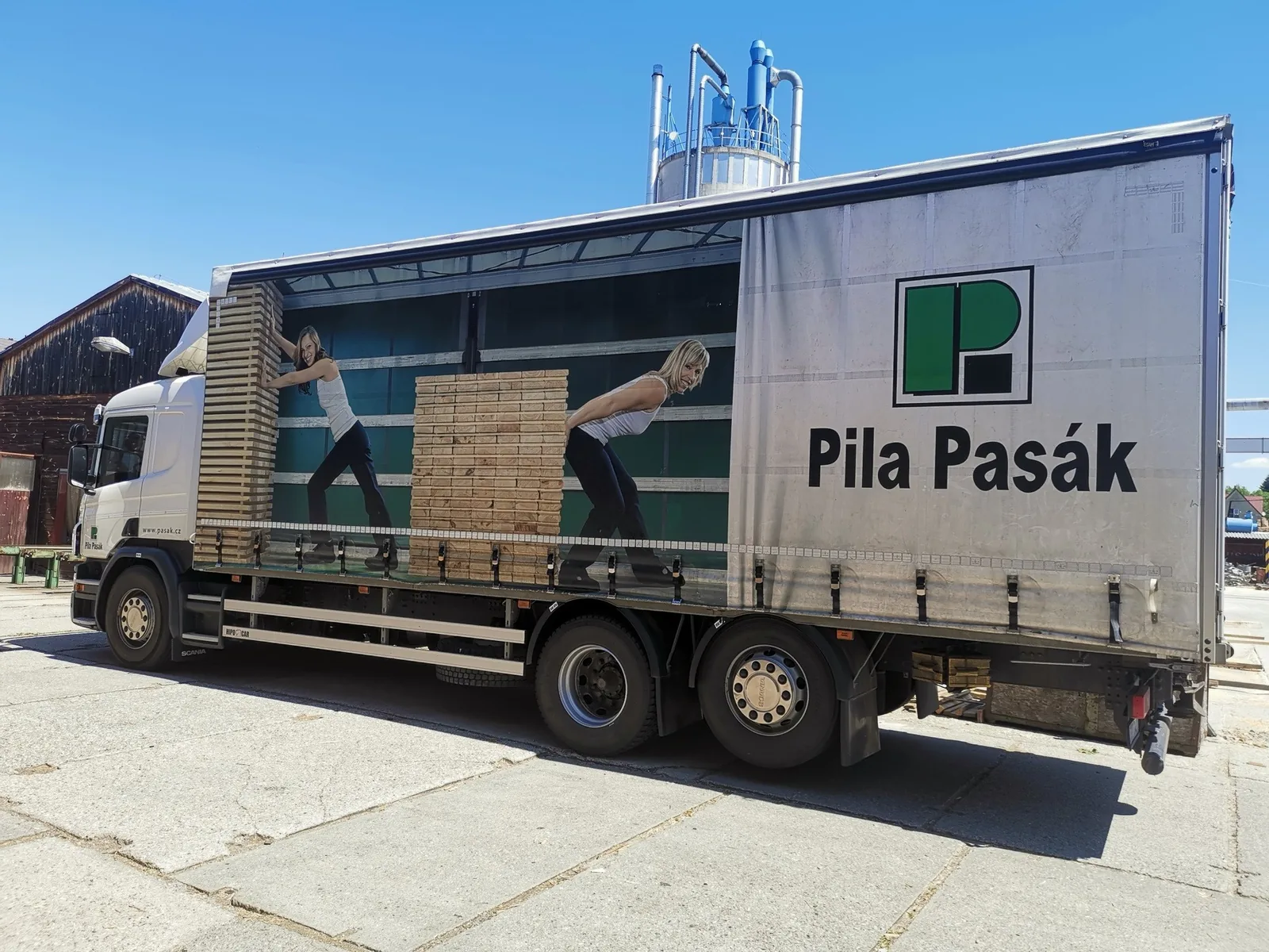 Pila Pasák branded delivery truck at the production site